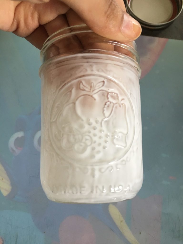 Glitter money jar for savings with glue