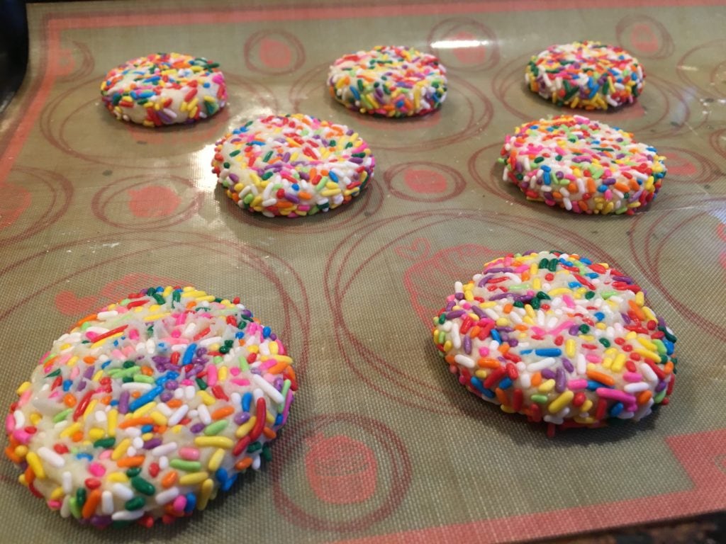 sprinkle cookies on the baking mat